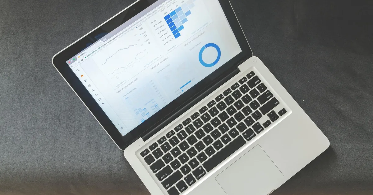 Laptop analytics dashboard used as a visual cue for AWS Budgets and Cost Explorer review