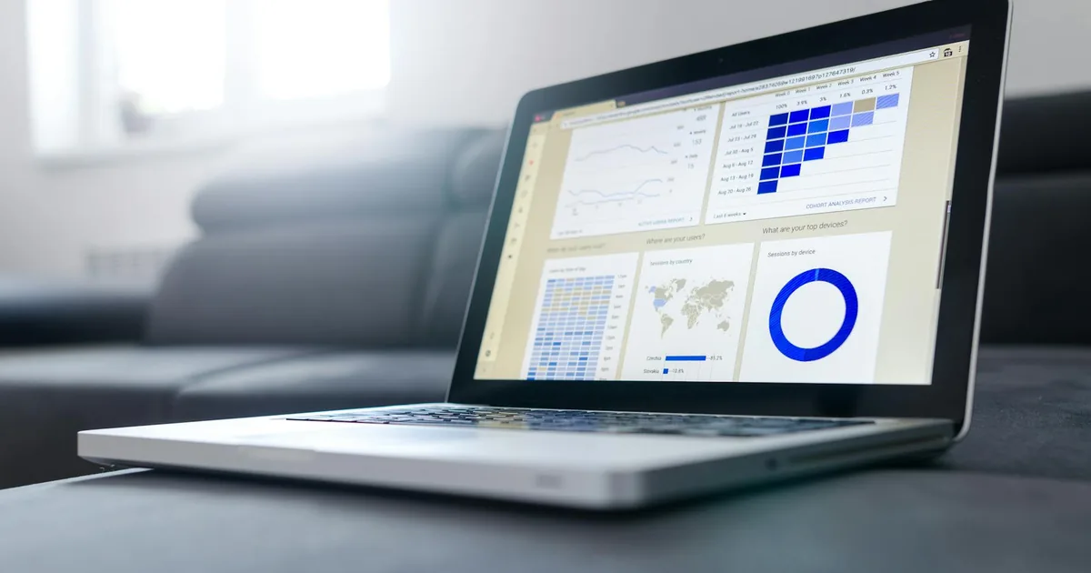 Laptop analytics dashboard used as a visual cue for reviewing AWS cost signals in Cost Explorer